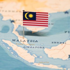 The Flag of Malaysia on the World Map.