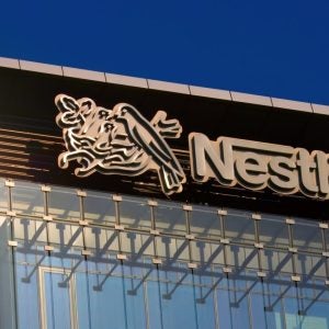 Nestlé corporate headquarters building displaying its iconic logo and name signage.