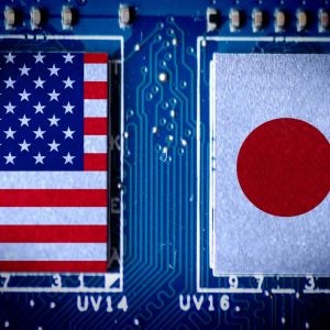 USA and Japan flags on microchips. The U.S. and Japan have a complex and evolving relationship in the semiconductor industry