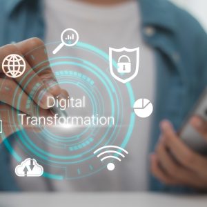 Businessman using digital transformation technology with cloud computing, cybersecurity, and data analytics for business innovation and future growth.